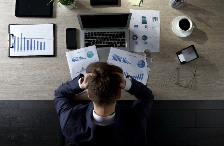 Man looking over business paperwork
